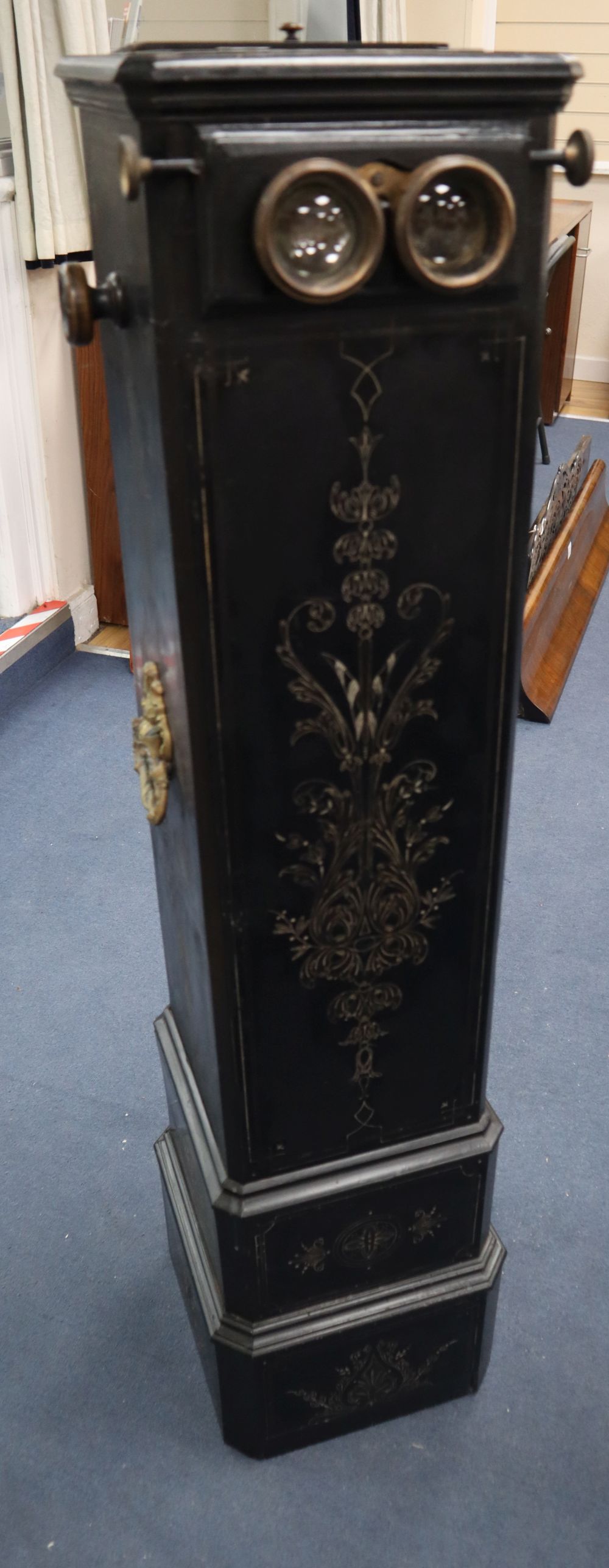 A late 19th century French ebonised floor standing stereoscopic photo viewer, width 26cm, depth 27cm, height 119cm